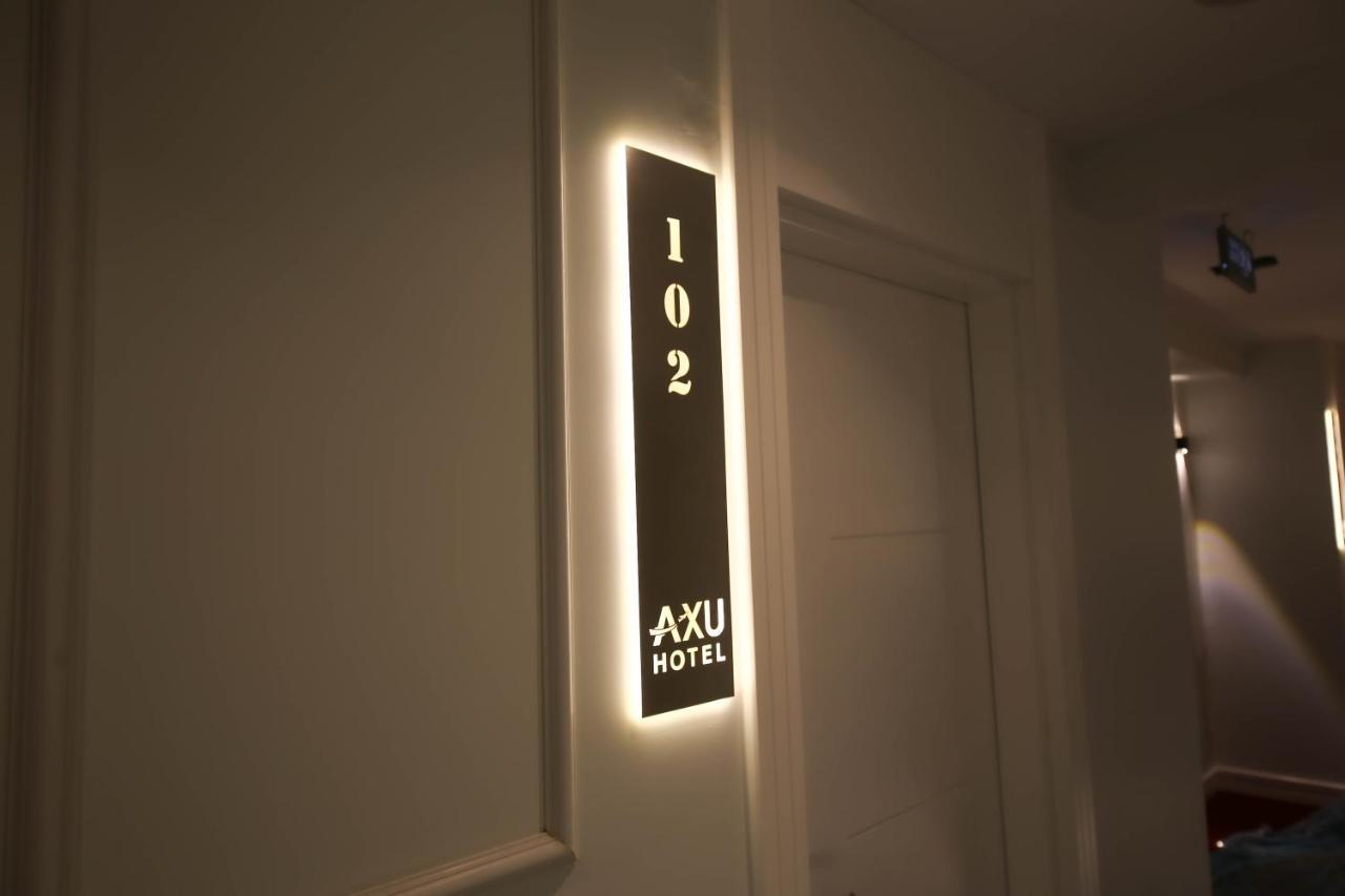 Axu Airport Hotel Arnavutkoy Extérieur photo A room number sign