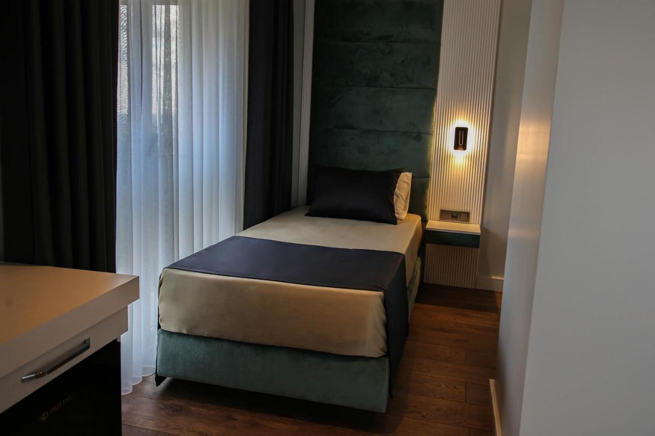 Axu Airport Hotel Arnavutkoy Extérieur photo A single room at the hotel