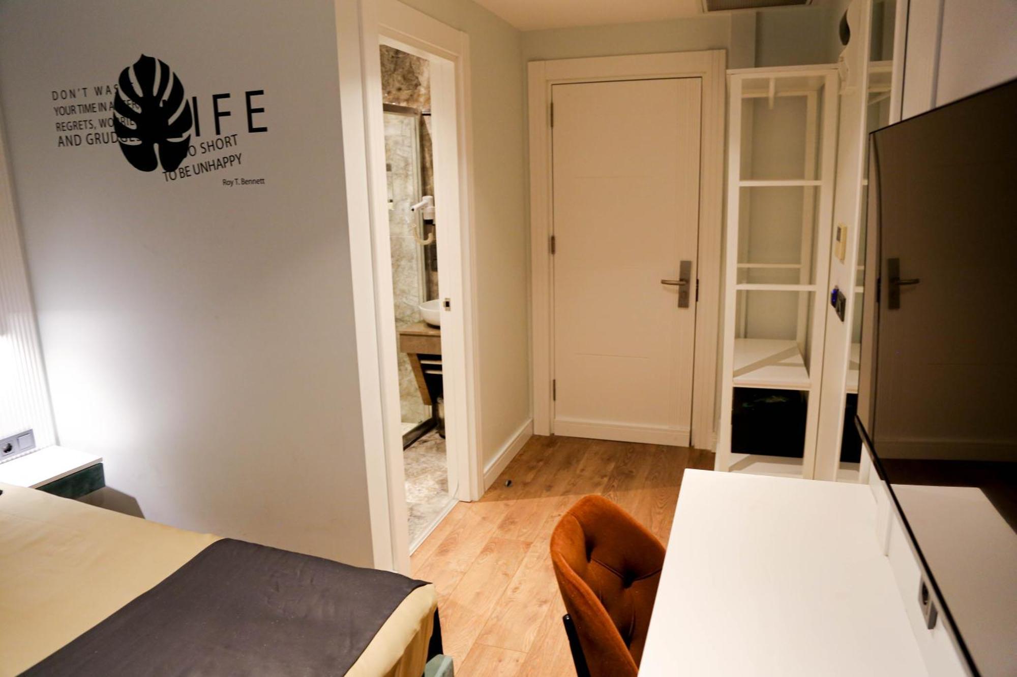 Axu Airport Hotel Arnavutkoy Extérieur photo Interior of a typical apartment